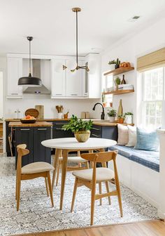 the kitchen is clean and ready to be used as a dining room or living room