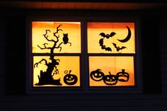 the window is decorated with halloween decorations