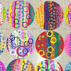 the colorful circles are painted with different colors and designs on them, as well as numbers