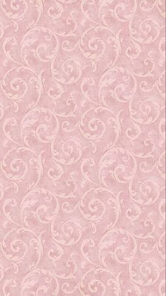 a pink wallpaper with white swirls on the top and bottom half of it