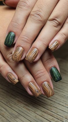 Bring the beauty of the outdoors to your fingertips with our Rustic Wood Grain nail art! This unique design features earthy tones and textured patterns that mimic the charm of natural wood. Perfect for autumn outings or cozy gatherings! Discover our step-by-step guide to achieve this rustic look!  #RusticWoodNails #NailArtInspiration #NatureInspired #FallNailDesign #NailInspo Wood Grain Nails, Woodland Nails, Nail Art Idea, Unique Nail Art, Thanksgiving Nail, Wood Nails, Fall Nail Trends, Embrace Nature, Thanksgiving Nails