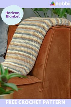 a brown chair with a crochet pillow on it and the text horizon blanket above it