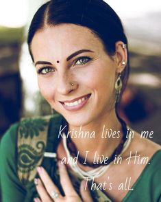 a woman smiling and holding her hands together with the words krishna lives time and live in him that's all