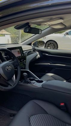 the interior of a car with its dashboard showing