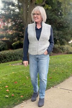 If you need ideas on how to style a vest this fall, look no further. A Well Styled Life is sharing different ways to style a vest to complete a casual outfit. They are the perfect third layer when you need a bit of extra warmth without overheating. They come in all shapes and styles, from grandpa sweater vests to tuxedo vests. Follow for more styling tips for women over 50, fall fashion finds and winter fashion. Style A Vest, How To Style A Vest, Women's Vests, Boucle Sweater, Sweater Vests, Grandpa Sweater, Better Style, Tips For Women