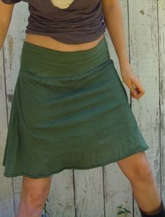 Shape - The Skort is a simple A-line skirt layered over short shorts that are attached at the waistband. Size - Order based on your HIP measurement Fabric Shown - Light Hemp/Organic Cotton Knit Color Shown - Terra-cotta, Olive Fitted Cotton Skirt With Built-in Shorts, Casual Hip-length Skirt With Built-in Shorts, Versatile Lightweight Fitted Bottoms, Versatile Fitted Lightweight Bottoms, Lightweight Fitted Versatile Bottoms, Casual Stretch Skirt For Everyday, Lightweight Cotton Casual Bottoms, Lightweight Fitted Bottoms For Spring, Casual Fitted Everyday Skirt