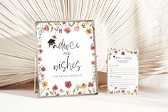 a photo frame with the words advice and wishes on it next to a notepad