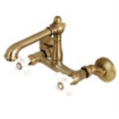 an antique brass faucet with three white balls on the side and two handles