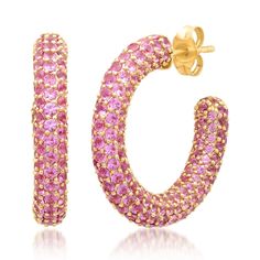 By Eriness 14K Yellow Gold Talk about a party! Featuring 8.31 carats of stunning pave pink sapphires, our 14K Gold Pink Sapphire Party Hoops are impossible to miss. Whether you're headed to a black tie event or a casual dinner out, these exquisite hoops turn heads and drop jaws. Classic, chic and fashion-forward, you'll wear these gorgeous hoops forever and then some. 8.31 carats 1" diameter Sold as a pair Made to order. Please allow approx 6 weeks for shipment Gemstone Party, Stephanie Gottlieb, Diamond Huggies, Diamond Stacks, Gold Ear Cuff, Ear Cuff Earings, Colorful Gifts, Black Tie Event, Engraved Gifts