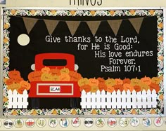 a bulletin board with an image of a truck and pumpkins