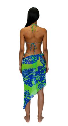 Mesh asymmetrical sarong 82% Polyester / 18% Spandex Hand wash cold, hang to dry Manufactured in Los Angeles Model is 5'9 - wearing a size small TOP SOLD SEPARATELY Fitted Asymmetrical Blue Bottoms, Tropical Green Sarong For Spring, Asymmetrical Blue Skirt For Summer, Green Tropical Beach Skirt, Green Asymmetrical Skirt For Beach, Green Asymmetrical Skirt For The Beach, Green Asymmetrical Fitted Skirt, Fitted Asymmetrical Green Skirt, Green Beachwear Skirt For Summer