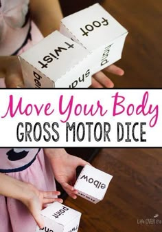 two children are playing with cross - motor dices and the words move your body across them