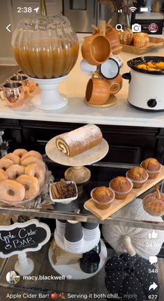 an assortment of baked goods on display at a bakery