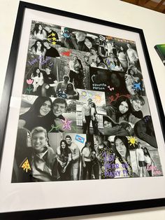 a black and white photo with many different people on it, framed in a wooden frame