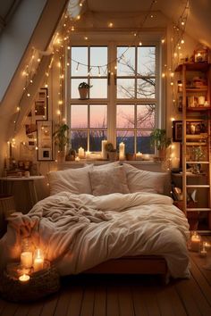 a bedroom with lights strung from the ceiling and a bed in front of a window