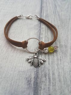 Bee charm bracelet Bee Bracelet Bee charm Charm Bracelet Bee Charm Jewelry, Diy Charm Bracelet Ideas, Suede Bracelet Diy, Bracelet En Cuir Diy, Faux Suede Bracelets, Charm Bracelet Diy, Leather Bracelet Tutorial, Bee Bracelet, Silver Initial Charms