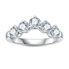 a white gold ring with five diamonds on it