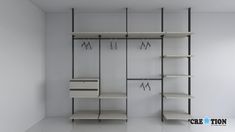 an empty white room with shelves and scissors