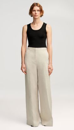 Our lightweight Jones Trouser is a quintessential piece that strikes a flawless balance between form and function. Made of breezy Italian linen, this pant features two back pockets in addition to a hidden credit card pocket in the front. Pair with a camisole, cardigan, and sandals for a classic outfit that will take you from season to season. Women Linen Pants, Elaine Welteroth, Denim Vests, Classic Outfit, Linen Pants Women, Linen Trousers, Work Outfits Women, Classic Outfits, Linen Women