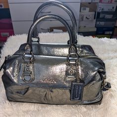 Metallic Pewter Handbag. Brand New Without Tags, Never Used. No Rips, Stains, Tears. Silver Satchel For Shopping, Silver Crossbody Satchel With Top Carry Handle, Silver Tote Satchel With Detachable Strap, Silver Satchel With Double Handle And Top Carry Handle, Silver Satchel With Double Handle, Silver Satchel Tote With Detachable Strap, Metallic Tote Bag For Formal Occasions, Designer Metallic Bag For Everyday Use, Elegant Metallic Satchel Bag