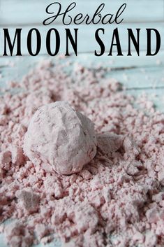 a pile of powdered sugar on top of a wooden table with the words general moon sand