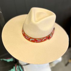 Tan colored wool pinch front western hat, paisley hat band included. 100% Wool. Made by M&F Western- Twister Hats Be sure to look for all our hat accessories! We have hat pins, bands, feathers, and more! Crown diameter measurements: Medium- 22", Large - 23", XL - 24" Western Hat, Hat Accessories, Western Hats, M F, Hat Band, Hat Pins, Tan Color, Feathers, To Look