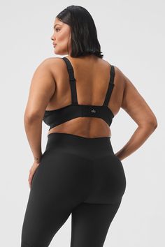 Designed with bonded edges for a seamless fit that molds perfectly to your body, the Strength Bra is straight-up sleek. It’s supportive, too, with hook-and-eye closures in back, a snug underbust band, and adjustable tank straps that can be worn crisscrossed or straight. Pair it with the matching Strength Leggings to make a set you’ll reach for constantly. Black Shapewear With Built-in Bra For Sports, Fitted Workout Bra With Adjustable Straps, Seamless Underwire Black Sports Bra, Bra-friendly Compression Full Coverage Shapewear, Full Coverage Compression Shapewear, Bra Friendly, Black Push-up Sports Bra With Removable Pads, Black Stretch Bra With Built-in Padding, Push-up Black Sports Bra With Removable Pads, Supportive Fitted Bra With Adjustable Straps