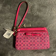 Pink Coach Wristlet Bow Design Never Been Used. Still Has Tags On. Fits A Phone. 2 Zipper Pockets 1 In Front, And 1 Zipper Pocket To Hold Cards/Keys/Phone/Etc. Pet Free/Smoke Free Home Elegant Pink Coach Wristlet, Coach Floral, Coach Keychain, Rose Bag, Accessories Pink, Lace Heart, Mini Charm, Heart Keychain, Leather Luggage