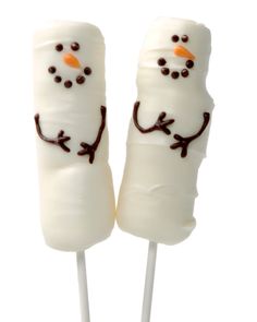 two marshmallows decorated like snowmen with the words save & pin on them