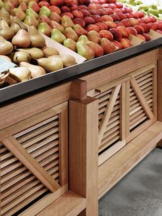 an assortment of fruits and vegetables on display