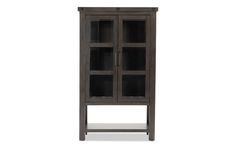 a wooden cabinet with glass doors on the front and bottom shelves in dark brown finish