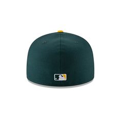 the new era fitted hat in green and yellow