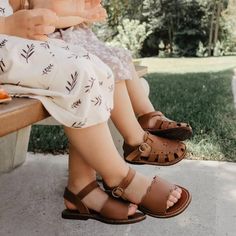 Can it just be sandal weather already so we can put our little girls in these!?😍 We’re in love with Adelisa & Co’s leather sandal Bella. With it’s delicate scallops and dainty vintage design, it has everything you’re looking for in a sandal for girls. Bella’s comfort and ability to compliment just about any outfit this summer will have you choosing it time and time again.  Available in baby, toddler, child and youth, & matching mom sizes. Vintage Leather T-strap Sandals With Open Toe, Vintage Leather T-strap Open Toe Sandals, Vintage Sandals With Leather Footbed For Spring, Brown Open Toe Barefoot Sandals For Spring, Spring Brown Open Toe Barefoot Sandals, Vintage Closed Toe Sandals With Leather Footbed, Vintage Sandals With Rubber Sole For Summer, Vintage Beach Sandals With Buckle Closure, Adjustable Brown Closed Toe Slingback Sandals