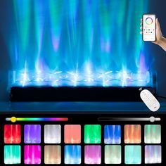 a person holding a remote control in front of a fire place with colored lights on it