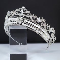 New to our Millennium collection, A Crown style Tiara suited for a Queen words are not enough to describe this pieces, it will leave you breathless... measures slightly over 2 inches at highest points sloping all the way down to 1.5 inches on the sides with 2 hoops on each end for bobbie pins. just spectacular Even we have hard time taking pictures because of their shine 😄 so we want to shine our brides on their special days. Simulated diamonds are also known as diamond simulants and include things like cubic zirconia (CZ), moissanite, and YAG. They can also include some natural clear gemstones like white sapphire, white zircon or even clear quartz. Simulated "diamonds" can be gorgeous but do not possess the chemical and physical properties of actual diamonds, so they generally sell for a Queens Tiaras, Crystal Crown Wedding, Bride Tiara, Diamond Simulant, Crystal Wedding, Bride Jewellery, Crystal Pearls, White Sapphire, Wedding Hair Accessories