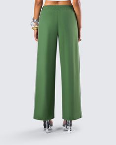 Even though it’s not a race, you’ll still take first place in these green track pants 😜 Perfect for dressing up or down, these pants are made from high quality ripstop fabric and complete with a relaxed fit, double piping on both sides, and side pockets 💚 Casual Green Pants With Elastic Side Panels, Sporty Green Pants With Elastic Side Panels, Green High-waisted Bottoms With Side Pockets, Green Wide-leg Parachute Pants With Elastic Waistband, Sporty Full-length Green Bottoms, Green Wide-leg Sweatpants With Elastic Waistband, Green Wide Leg Parachute Pants With Side Pockets, Green Wide-leg Parachute Pants, Green Sporty Pants With Side Pockets