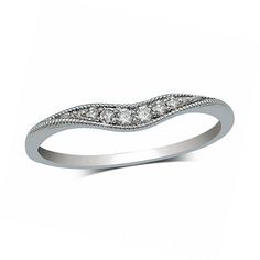 a white gold wedding ring with diamonds on it's sidestone, in the shape of a wave