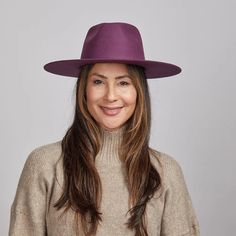 Rancher Vivid | Womens Colored Felt Fedora Hat is perfect for women who want to make a bold statement. Crafted from wool felt with a wide brim, its vibrant colors and sleek design add a pop of style to any look. Material: Wool Felt Shape: Tear Drop Western Trim: No Trim Brim size: 3 1/2" Crown height: 4 1/8" Sweatband: Adjustable Velcro Sweatband Imported Modern Flat Brim Felt Hat For Fall, Modern Wide Brim Felt Hat For Fall, Modern Curved Brim Felt Hat For Fall, Modern Felt Hat With Flat Brim For Fall, Modern Felt Hat With Curved Brim For Fall, Modern Felt Fedora For Fall, Modern Wide Brim Fedora For Winter, Modern Flat Brim Felt Hat For Winter, Modern Wide Brim Felt Hat For Winter