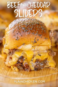 a cheeseburger on a wooden cutting board