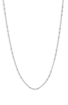 Add sophisticated shine to your layered look with this disc station necklace crafted from sterling silver. Sterling silver Imported Minimalist Silver Layered Necklace, Silver Sterling Station Necklace With Delicate Chain, Delicate Sterling Silver Station Necklace, Silver Satellite Chain Necklace For Everyday, Silver Minimalist Satellite Chain Necklace, Silver Satellite Chain Necklace Minimalist Style, Everyday Silver Sterling Silver Layered Necklace, Silver Necklaces With Beaded Chain For Layering, Silver Beaded Chain Necklace For Layering