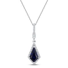 This elegant sterling silver necklace showcases a striking shield-cut blue lab-created sapphire at its center, framed in sparkling white lab-created sapphires. A marquise-cut and round-cut white lab-created sapphire shimmer above, and more round white lab-created sapphires adorn the bail to finish the look. The pendant hangs from an 18-inch cable chain that secures with a lobster clasp. Formal Sapphire-colored Diamond Pendant Necklace, Formal Sapphire Diamond Cut Necklace, Formal Sapphire Diamond Necklace With Diamond Cut, Blue Marquise Cut Jewelry With Diamond Accents, Classic Blue Diamond Necklace With Diamond Cut, Classic Blue Diamond Cut Necklace, Classic Blue Diamond Necklace With Accents, Classic Blue Diamond Cut Diamond Necklace, Sapphire Jewelry With Diamond Accents In Marquise Cut