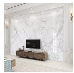 a living room with white marble walls and furniture in the center, along with a flat screen tv