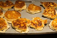 some food is cooking in a pan on top of the stove burner and ready to be cooked