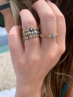 EVIL EYE 🧿 BAND RING:: PRICE PER 1 RING STACKABLE STONES: Cubic Zirconia SIZES: 6,7,8 MATERIAL: Sterling Silver plated with 18 KG or Sterling Silver Ward Off Evil from your life with this easy to wear Evil Eye Ring. The eye protects it’s wearer from jealousy, bad luck and ill wishes from others. Great gift for all your friends and family. Always made with ❤️ .........................................................Follow us on Instagram to stay updated on new pieces, promotions, and give away e Evil Eye Jewelry Rings, Evil Eye Bracelet Diy, Artsy Wallpaper, Evil Eye Ring Gold, Eye Band, Evil Eye Art, Evil Eye Ring, Jewelry Picture, Bad Luck