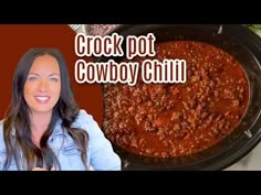 a woman standing in front of a crock pot filled with chili next to the words crock pot cowboy chili