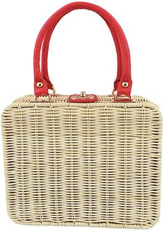 a wicker handbag with red handles