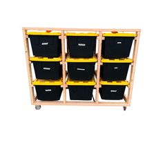 a wooden shelf filled with black and yellow bins