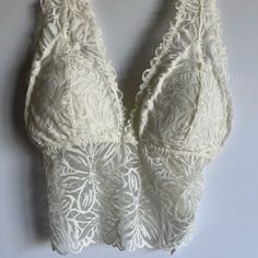 Aerie Lace Padded Bra’s So Beautiful, Comes As A Set Of Two, Size :S Color: Orange And White Box 2 White Lace Tops With Built-in Bra, White V-neck Bra-friendly Tops, White V-neck Bra Friendly Tops, White V-neck Top Bra Friendly, White V-neck Tops, Bra Friendly, White Camisole Bra With Lace Trim, White Lace Trim Camisole Bra, White Cami Intimate With Built-in Bra, White Lace Bra Friendly Camisole