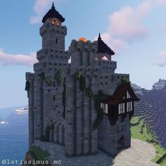 a large castle sitting on top of a cliff next to the ocean in minecraft