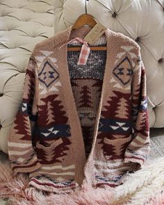 Cozy Fit Loungewear Cardigan, Cozy Fit Cardigan For Loungewear, Cozy Long Sleeve Beige Sweater Coat, Cozy Beige Long Sleeve Sweater Coat, Cozy Chunky Knit Outerwear With Relaxed Fit, Cozy Fair Isle Cardigan For Fall, Cozy Fair Isle Pattern Cardigan For Fall, Beige Sweater For Fall Loungewear, Cozy Knit Relaxed Fit Outerwear